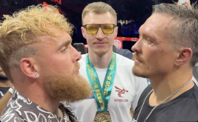 Jake Paul e Oleksandr Usyk já chegaram a fazer uma encarada em julho deste ano (Foto: Reprodução)